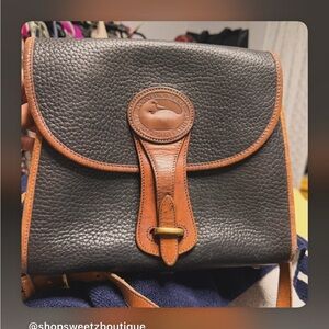 Dooney & Bourke Black with Brown Trim Pebbled Leather Crossbody